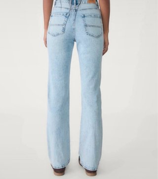 Pantalón vaquero campana desgastado