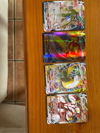 Cartas Pokémon VMAX y Vintage 1999