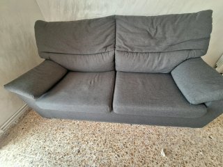 Sofá gris de tela