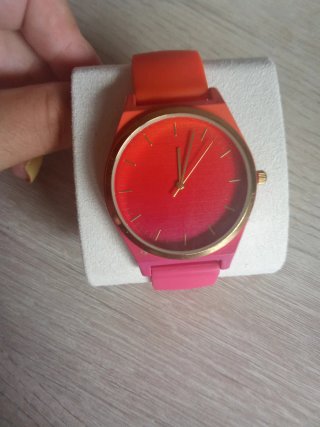 Reloj bicolor naranja y rosa
