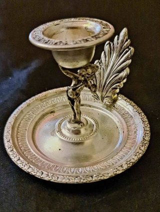 antica Bugia portacandela con putto