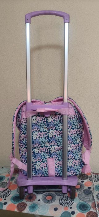 Mochila Benetton floral .