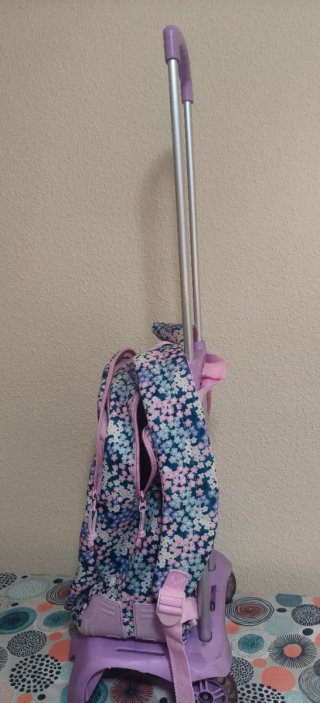 Mochila Benetton floral .