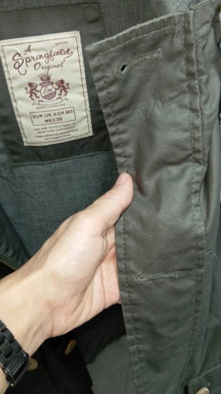 Chaqueta impermeable gris