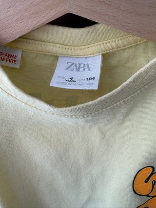 Camiseta infantil amarilla con palmera