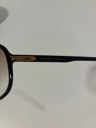 Gafas de sol Gucci negras y marrones