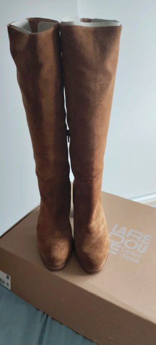 Botas de piel marrones altas