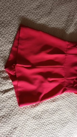 Mono rosa con volantes talla XS