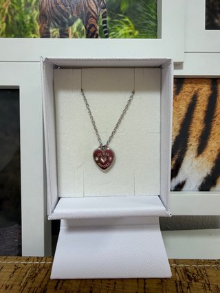 Colgante Guess Amore en acero inoxidable