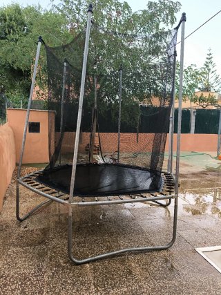 Trampolino elastico per bambini con rete di sicurezza