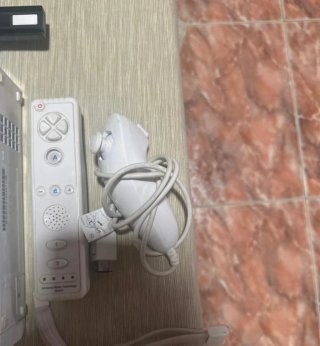 Consola Nintendo Wii + Juegos y Accesorios