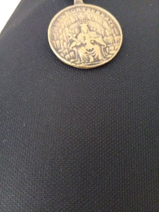 Medalla antigua San Benito