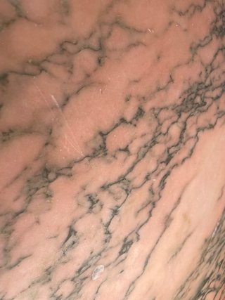 Tablero redondo de mármol rosa macizo