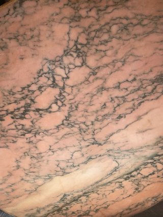 Tablero redondo de mármol rosa macizo