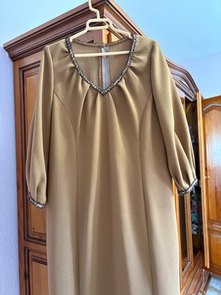 Abrigos para invierno y vestidos elegantes