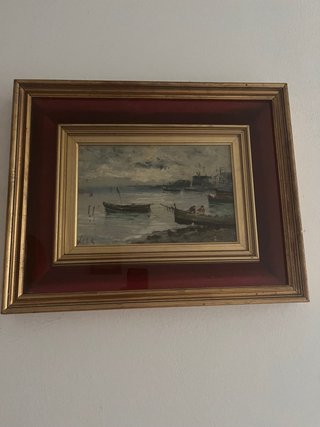 Quadro con cornice dorata e passepartout rosso