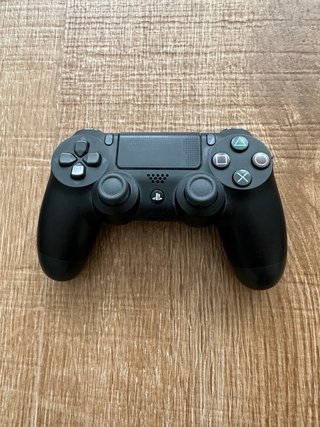PS4 Negra con Mando y 2 Juegos