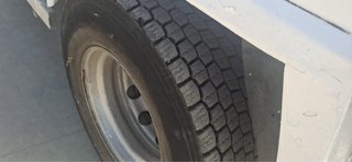 Camión grúa basculante Iveco Eurocargo