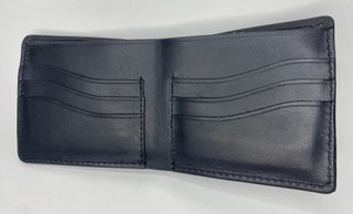 Cartera de cuero artesanal hecha a mano