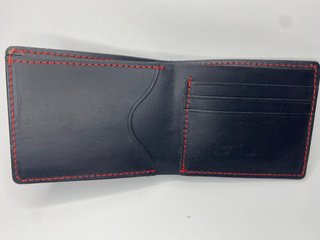 Cartera de cuero artesanal hecha a mano
