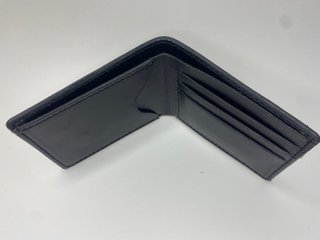 Cartera de cuero artesanal hecha a mano