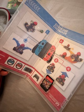 Nintendo Switch OLED + Mario Kart 8 Deluxe