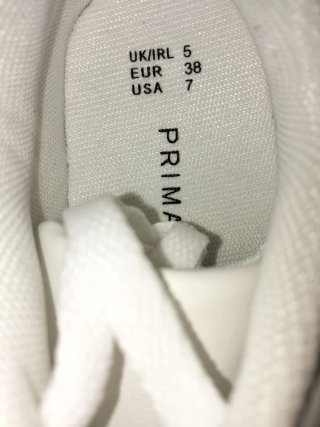 Zapatillas blancas y rosas