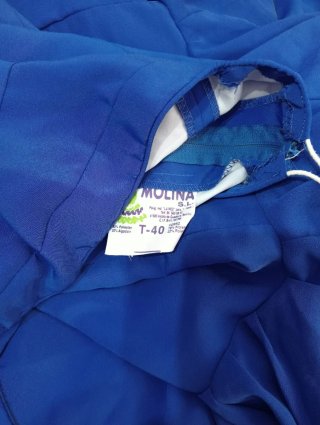 Traje de flamenca azul con volantes