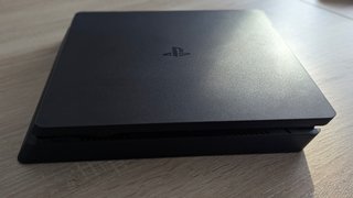 PS4 Slim 1TB + Mando DualShock 4 + Caja