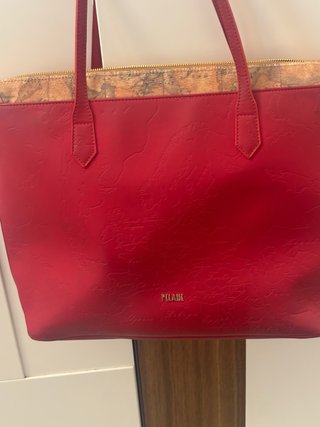 Borsa oro e rossa