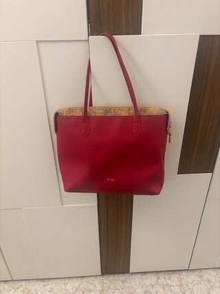 Borsa oro e rossa