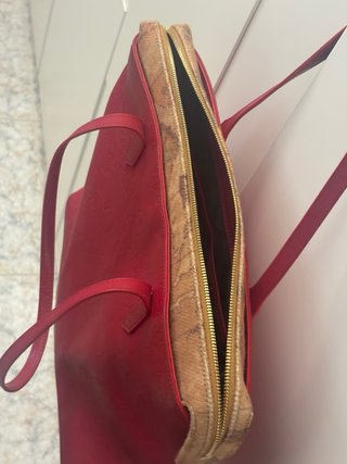 Borsa oro e rossa