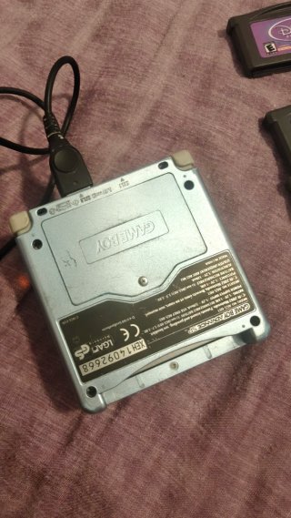 Nintendo Game Boy Advance SP + Cargador y Juegos