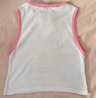 Camiseta sin mangas blanca con ribete rosa