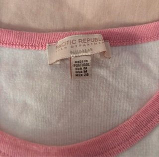 Camiseta sin mangas blanca con ribete rosa