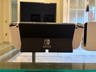 Nintendo Switch OLED Blanca + Mando + Wii Sports