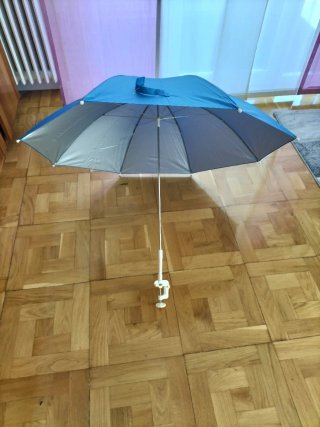 Sombrilla para hamaca o silla de terraza.