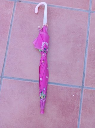 Paraguas infantil rosa con dibujos