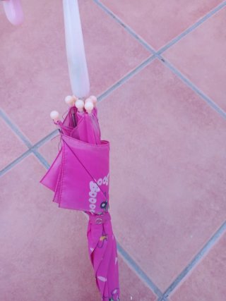 Paraguas infantil rosa con dibujos