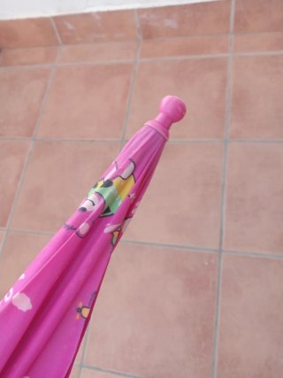 Paraguas infantil rosa con dibujos