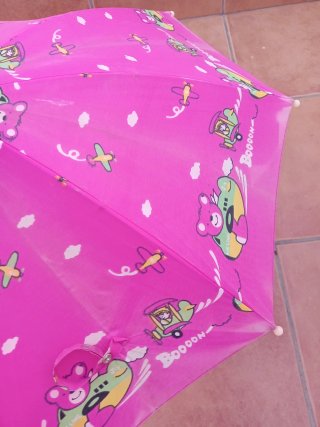 Paraguas infantil rosa con dibujos