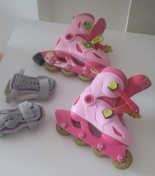 Patines rosas niña Oxelo con protecciones
