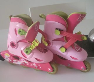Patines rosas niña Oxelo con protecciones