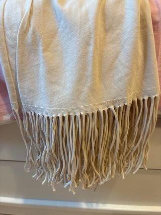 Vestido beige con flecos