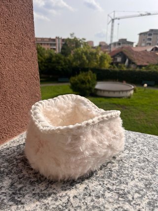 Pochette in pelliccia bianca