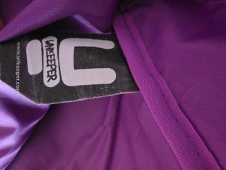 Mochila TIKTOKERS preta e lilás
