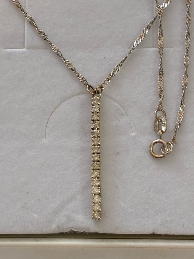 Colgante Tira Oro 18k con Diamantes 0.75 Ct