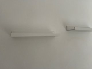 Estantes de pared metálicos blancos