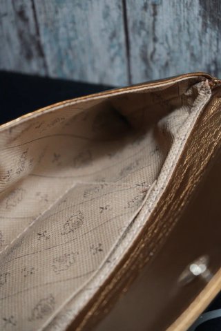 Cartera de mano bronce