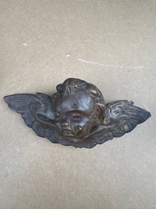 Figura de ángel antigua